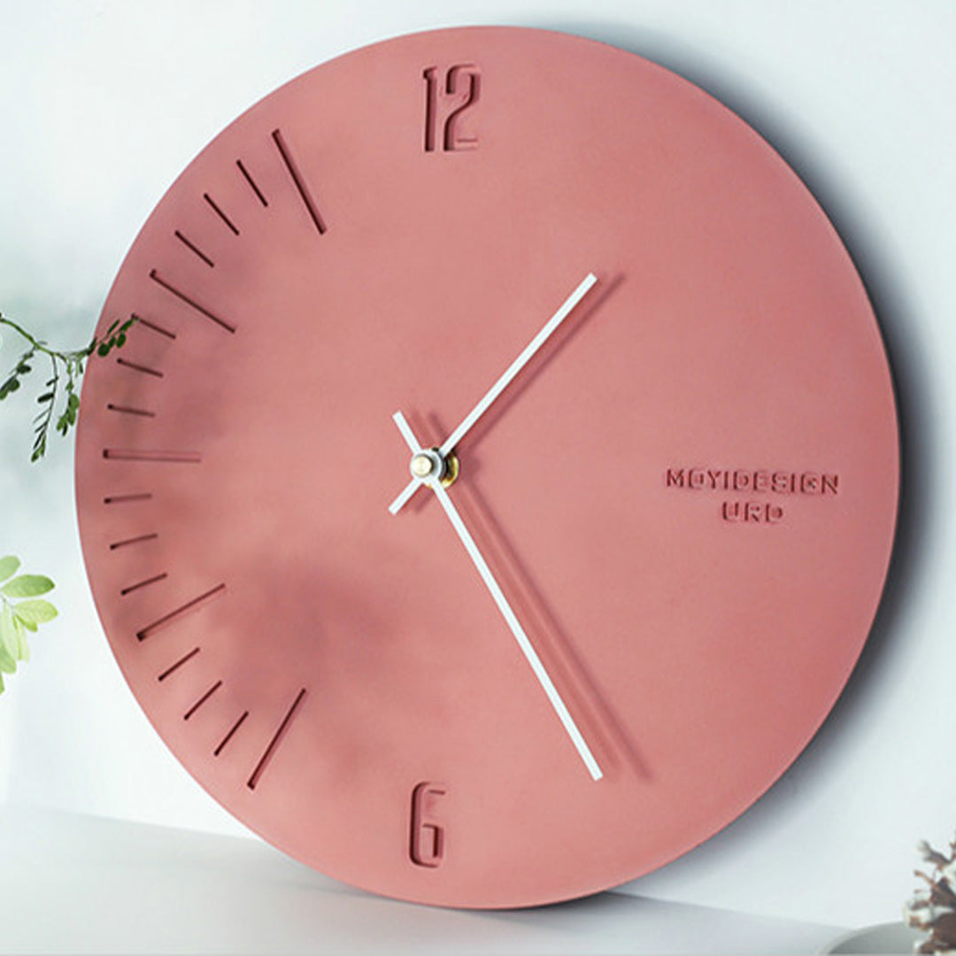 Cement Wall Clock The design enhanced by a unique cement finish, offering an industrial twist on traditional accessories.