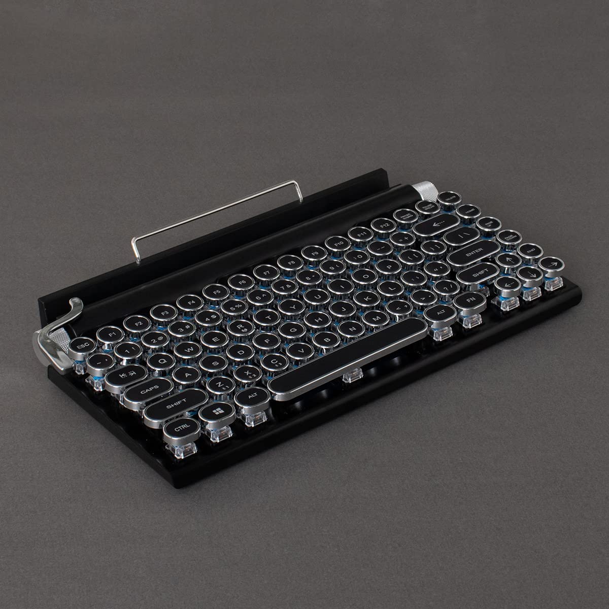 Retro Typewriter Keyboard the thickness is less than 5/8 inches.