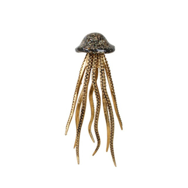 Flying Octopus Statue These handcrafted octopus and squid figures are sure to liven up any room or table.