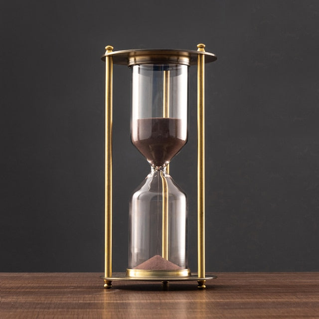 Brass Hourglass the three poles give you ease to hold if you want to move it.