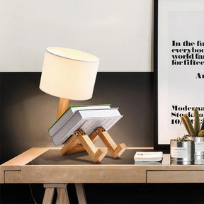 Robot Wooden Table Lamp with a fabric shade that will look beautiful