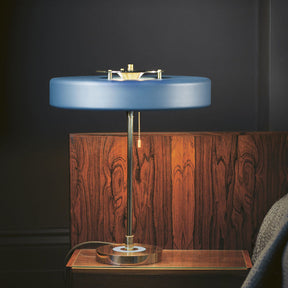 Fester Table Lamp The base surface epitomizes a lavish vibe that reflects the sparkles.