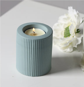 Lucide Candlestick Holder with a pastel background